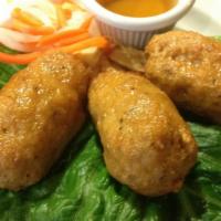 Sugarcane Shrimp (3) · Sweet sugarcanes wrapped with savory minced shrimp and pork, then deep fried. Served with ou...