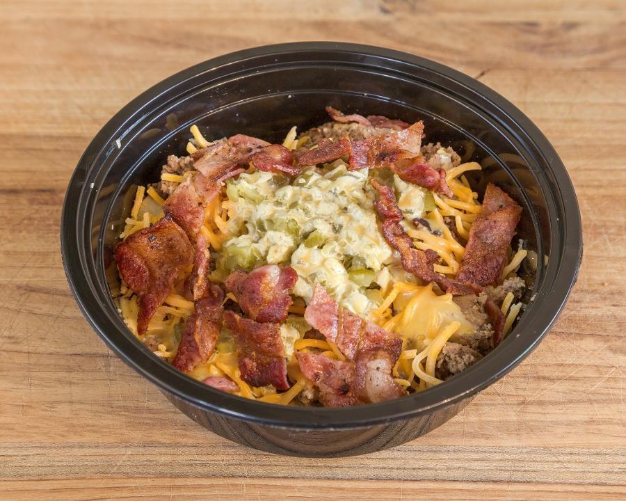 Turkey Cheeseburger Bowl · Lean Seasoned Ground Turkey over Jasmine rice, topped with Cheddar Cheese, dill relish, crispy onions, and our Signature Munch Sauce.. Estimated Macros per Bowl. Cal: 443 | Carb: 48g | Fat: 19g | Protein: 28g