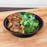 Munch Chicken & Steak Bowl · Pan-seared steak and grilled chicken breast with teriyaki sauce, served over Jasmine rice, w...