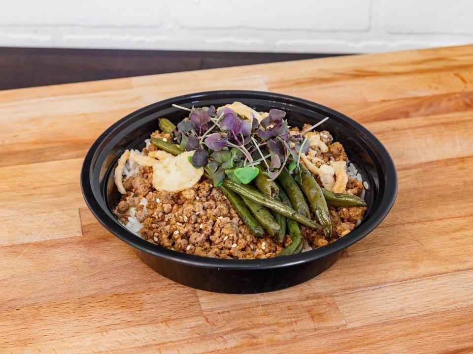 Mongolian Bowl · Lean ground beef in a sweet Yashido sauce, served over Jasmine rice, topped with green beans, crispy onions, and sesame seeds. . ESTIMATED MACROS: . CAL: 436 | CARB: 45G | FAT: 10G | PROTEIN: 23G