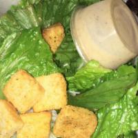 Small Caesar Salad · Crisp romaine lettuce tossed with Caesar dressing and topped with shredded Parmesan and crou...