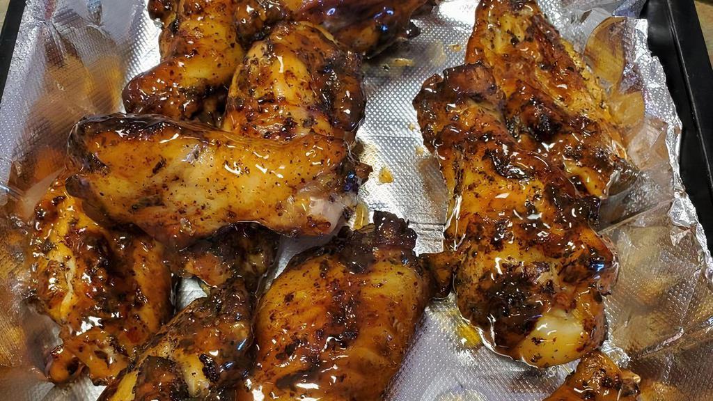 Homemade Saucy Chicken Wings · Sprinkled with our special seasonings and baked to perfection. Tossed with your choice of sauce.