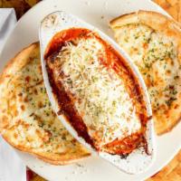 Classic Lasagna · Bubbling layers of pasta, seasoned ground beef, our signature marinara, and herbed ricotta t...