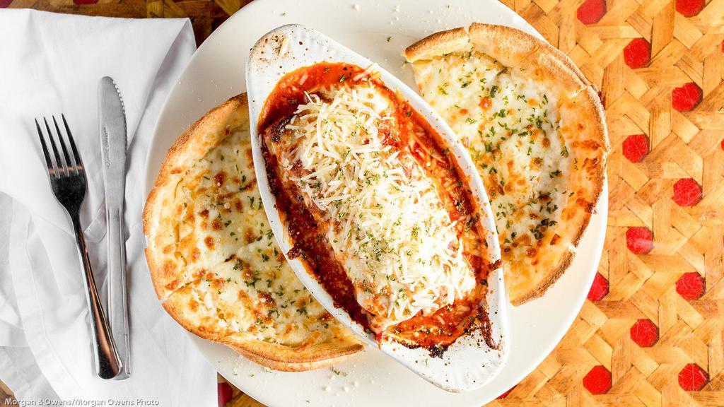 Classic Lasagna · Bubbling layers of pasta, seasoned ground beef, our signature marinara, and herbed ricotta topped with mozzarella. All pasta served with your choice of Caesar, Mediterranean or Italian salad and your choice of fresh-baked breadsticks or garlic bread.