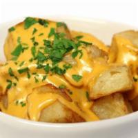 Patatas Bravas · Potatoes w/ spicy mayo