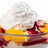 Raspberry Mango Sundae · Vanilla ice cream topped with sweet mango chunks, a tart raspberry puree, and whipped cream.