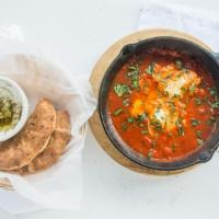 Shakshuka Platter · Poached eggs, red onion, tomato and red peppers.