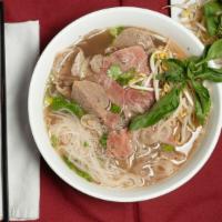 Beef Pho House Special (Phở Đặc Biệt) · The works, our most popular Pho combining all of the favorites: eye-round steak, brisket, an...
