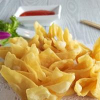 Money Bag · Cream cheese, crab meat, and vegetable wrapped in wonton skin, deep fried with chili sauce.