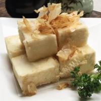 Age Tofu · Fried tofu and with tempura sauce.