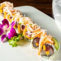 Amazing Roll · Tuna, yellowtail, mango inside with salmon, avocado, crab meat and special sauce on top.