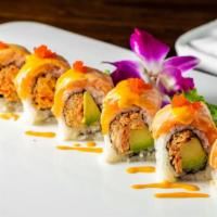 Tiger Roll · Spicy crab, avocado inside, topped with Seared salmon and special sauce.