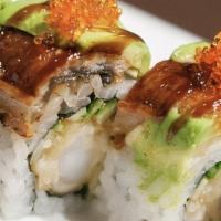 Dragon Roll · Shrimp tempura, eel and avocado, flying fish roe, eel sauce and spicy mayo.