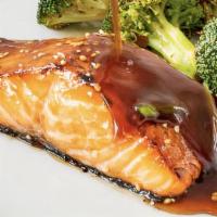 Salmon Teriyaki  · Grilled salmon serve with vegetables and teriyaki sauce rice and miso soup.