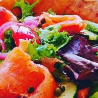 Smoked Salmon Salad · Norwegian smoked salmon, pickled red onion, tomatoes, cucumbers, capers, mixed greens, butte...