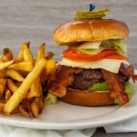 All American Burger · Topped with lettuce, tomato, onion and American cheese.