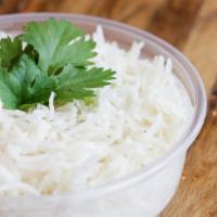 Arroz Blanco · Steamed basmati rice. Gluten friendly. Vegetarian.