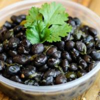 Black Beans · Slow cooked with fresh cilantro, cumin, and sofrito (onions, red bell pepper and garlic leek...