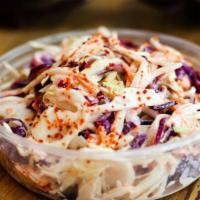 Caribbean Cole Slaw · Red cabbage, white cabbage, carrots and Caribbean pineapple dressing. Gluten friendly. Veget...