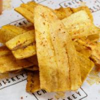 Green Plantain Chips · House made dusted with Tajin. Gluten friendly. Vegetarian.