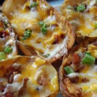 Potato Skins · cheddar jack, scallions, bacon, sour cream