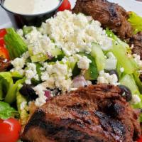 Kebab Salad · house steak tips, romaine, iceberg,  feta, tomatoes, cucumbers, green and red peppers, black...