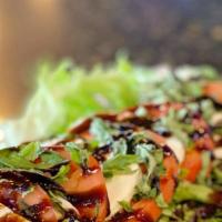 Caprese Salad · romaine, fresh mozzarella, sliced tomato, balsamic glaze