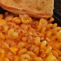 Buffalo Chicken Mac & Cheese · cavatappi, house cheese sauce, buffalo chicken,buttered bread crumbs, served with garlic bread