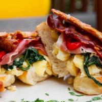 Gavone On A Croissant · House Specialty - The Gavone
A Little Bit of Everything!
Imported Prosciutto, Sweet Peppers,...