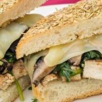 The Anthony Panini · Marinated grilled chicken, sauteed spinach, and grilled portabella mushroom caps with fresh ...