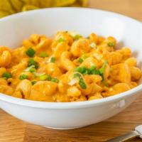 Buffalo Chicken Dip Mac  · Delight in cavatappi pasta with diced chicken, buffalo sauce, beer cheese sauce with diced t...