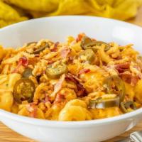 Jalapeno Bacon Mac · Spice it up with shredded bacon, beer cheese sauce, pickled jalepeno, crispy onions and extr...