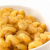 Simple Mac (Vegetarian) · Cavatappi pasta mixed with shredded cheddar cheese and beer cheese sauce.