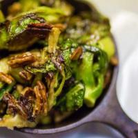 Brussels Sprouts · Roasted Brussels sprouts and butternut squash.  glazed with maple syrup, garlic, almonds, an...