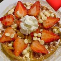 Love Me Cupid · Our house-made golden-brown Belgian waffle dusted with powdered sugar, fresh Strawberries to...