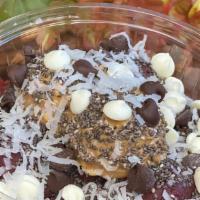 Power Bowl · Acai, Peanut Butter, Coconut Flakes, Chia Seeds and Chocolate Chips.