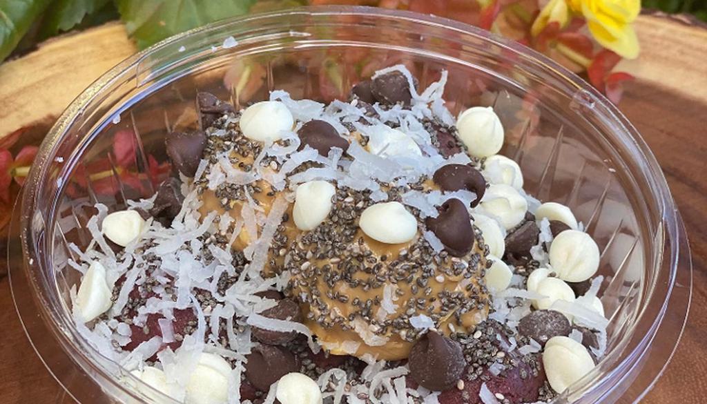 Power Bowl · Acai, Peanut Butter, Coconut Flakes, Chia Seeds and Chocolate Chips.