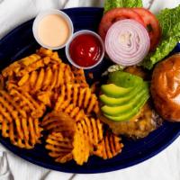Tortuga Burger · Burger topped with cheese, chipotle mayo, lettuce, tomato, red onion and sliced avocados.