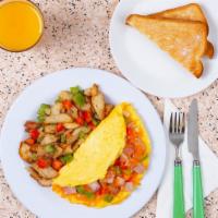 Western Omelette · Three egg omelette with melted cheddar, ham, onion, and bell peppers, served with buttered t...