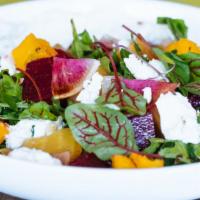 Beet & Arugula · Shellbark goat cheese, crispy polenta croutons, and herb creme fraiche. Allergens: dairy and...