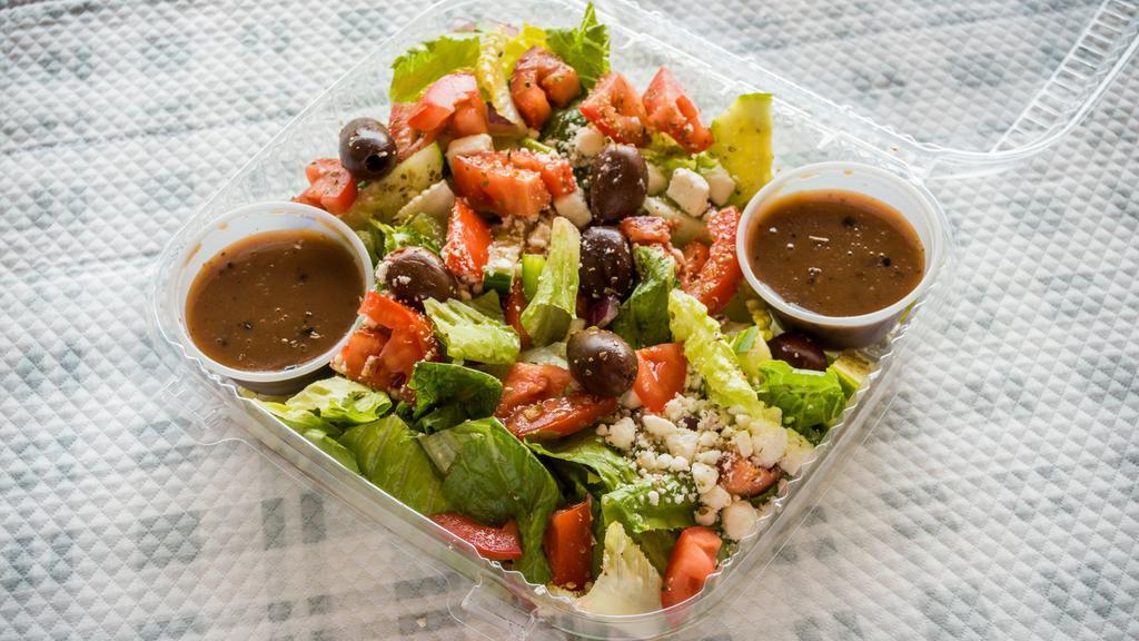 Greek Salad · Romaine lettuce, tomato, cucumber, green peppers, onion, olive, and feta cheese.