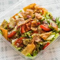 Fattoush Salad · Lettuce, tomato, cucumber, garlic, onion, and toasted pita chips.