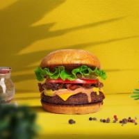 The New Classic Vegan Burger  · Seasoned plant-based patty topped with lettuce, tomato, onion, and pickles. Served on a bun.