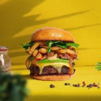 Locked And Loaded Burger  · Plant-based patty, fries, avocado, onion, lettuce, tomato, onion, and pickles. Served on a b...