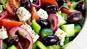 Greek · Garden salad topped with feta cheese