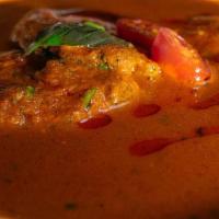 Kerala Red Fish Curry  (Gf) · Fish & Spices are synonymous with Kerala - White-Bass simmered in a tangy Tamarind & Coconut.