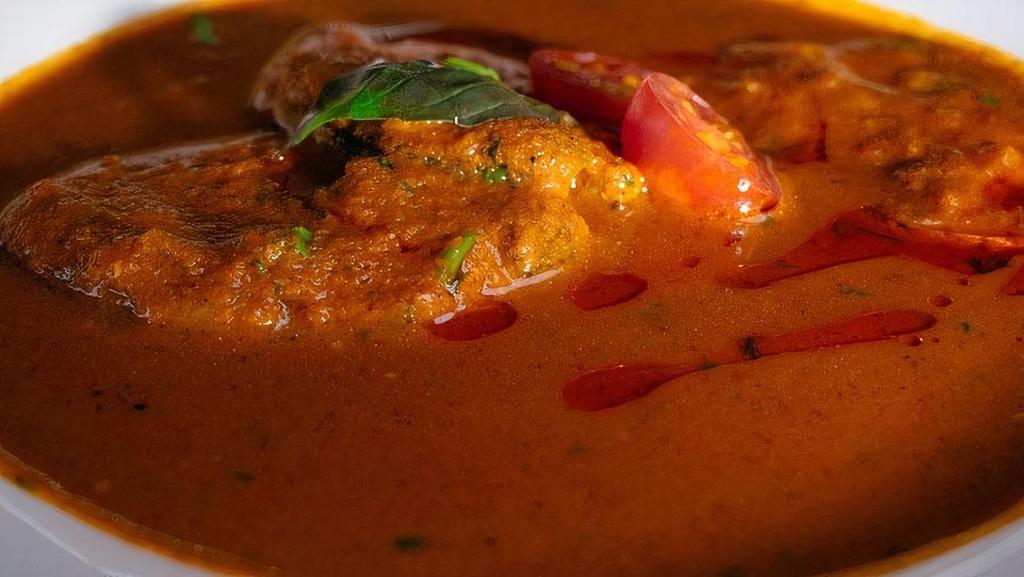 Kerala Red Fish Curry  (Gf) · Fish & Spices are synonymous with Kerala - White-Bass simmered in a tangy Tamarind & Coconut.