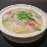 Seafood With Tofu In Casserole · Shrimp, Flounder, Crab Stick, Snow Pea, Soft Tofu, Bamboo Shoot, Mushroom, White Sauce