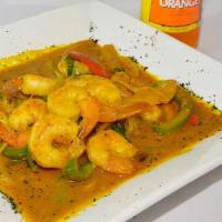 Curry Shrimp · Cooked in a curry sauce with the finest herbs and vegetables. Seasoned to perfection.