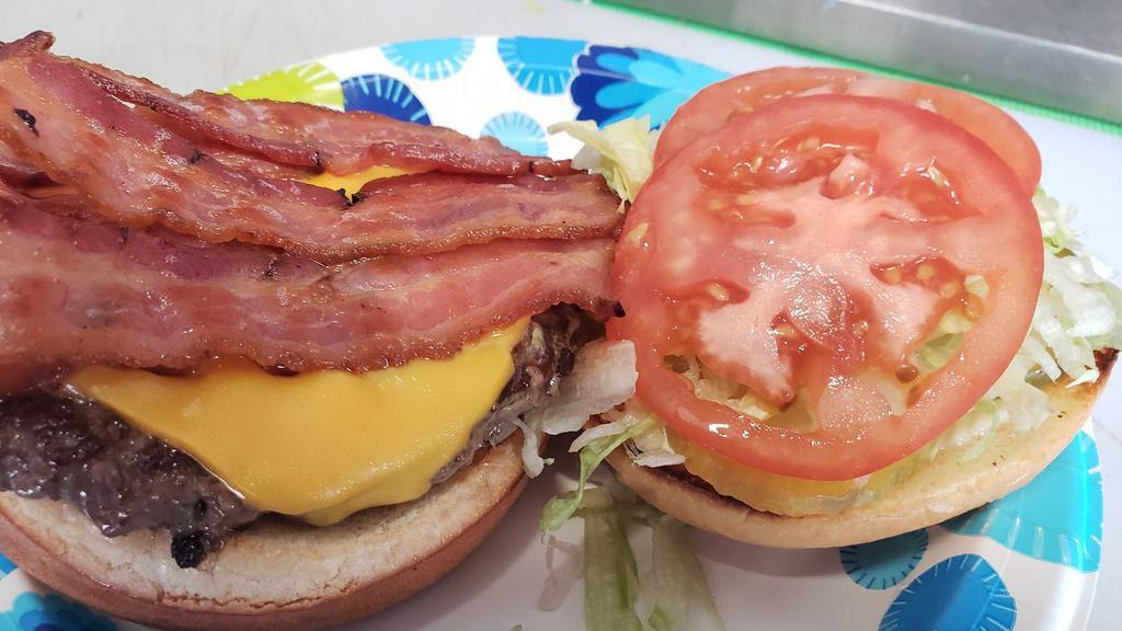 Bacon Cheese Burger · 3 strips of crispy bacon + cheese .